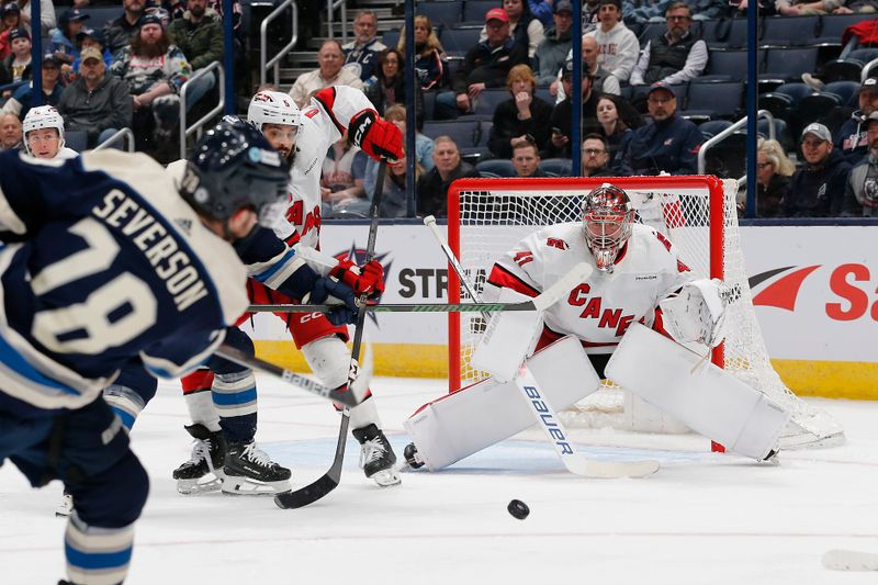 Feb 29, 2024; Columbus, Ohio, USA; Carolina Hurricanes goalie Spencer Martin (41) awaits the shot attempt from Columbus Blue Jackets defenseman Damon Severson (78) during the first period at Nationwide Arena. Mandatory Credit: Russell LaBounty-USA TODAY Sports