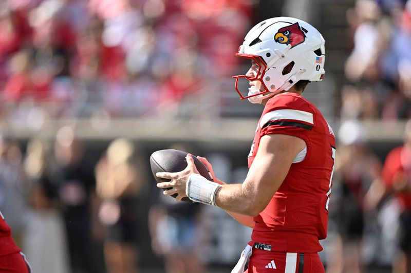 Oct 4, 2025; Louisville, Kentucky, USA; Louisville Cardinals quarterback Miller Moss (7) looks to pass during the first quarter against the Virginia Cavaliers at L&N Federal Credit Union Stadium. Mandatory Credit: Jamie Rhodes-Imagn Images