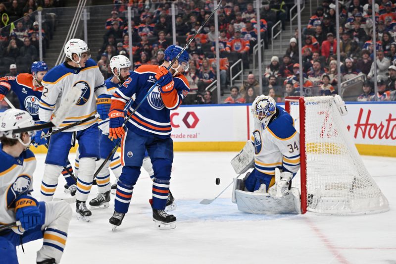 Dec 9, 2025; Edmonton, Alberta, CAN;  Edmonton Oilers righgt winger Vasily Podkolzin (92) gets in front of Buffalo Sabres goalie Alex Lyon (34) during the third period at Rogers Place. Mandatory Credit: Walter Tychnowicz-Imagn Images
