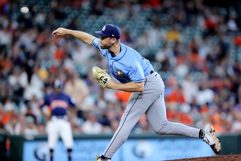 Jul 30, 2023; Houston, Texas, USA; Tampa Bay Rays relief pitcher Jason Adam (47) delivers a pitch against the Houston Astros during the ninth inning at Minute Maid Park. Mandatory Credit: Erik Williams-USA TODAY Sports