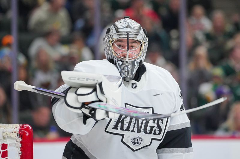 Nov 5, 2024; Saint Paul, Minnesota, USA; Los Angeles Kings goaltender David Rittich (31) watches the puck against the Minnesota Wild in the second period at Xcel Energy Center. Mandatory Credit: Brad Rempel-Imagn Images