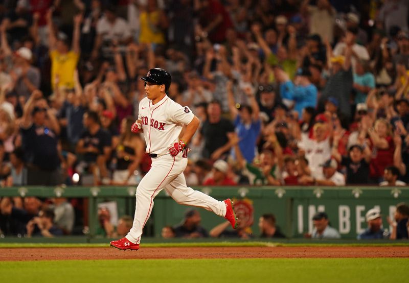 Jul 11, 2024; Boston, Massachusetts, USA; Boston Red Sox designated hitter Masataka Yoshida (7) hits a two run home run against the Oakland Athletics in the sixth inning at Fenway Park. Mandatory Credit: David Butler II-USA TODAY Sports