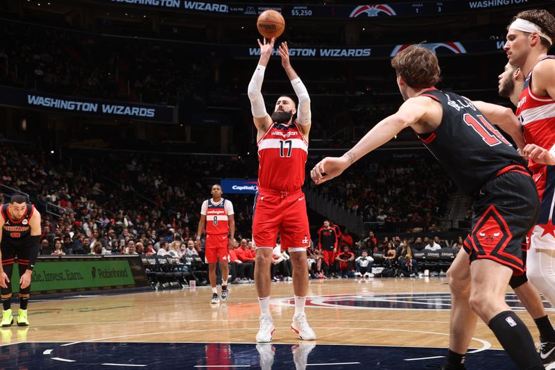 WASHINGTON, DC -? JANUARY 1: Jonas Valanciunas #17 of the Washington Wizards shoots a free throw during the game against the Chicago Bulls on January 1, 2025 at Capital One Arena in Washington, DC. NOTE TO USER: User expressly acknowledges and agrees that, by downloading and or using this Photograph, user is consenting to the terms and conditions of the Getty Images License Agreement. Mandatory Copyright Notice: Copyright 2025 NBAE (Photo by Kenny Giarla/NBAE via Getty Images)