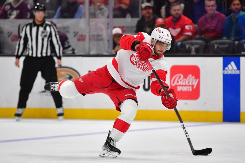 Jan 7, 2024; Anaheim, California, USA; Detroit Red Wings defenseman Shayne Gostisbehere (41) shoots on goal against the Anaheim Ducks during the first period at Honda Center. Mandatory Credit: Gary A. Vasquez-USA TODAY Sports