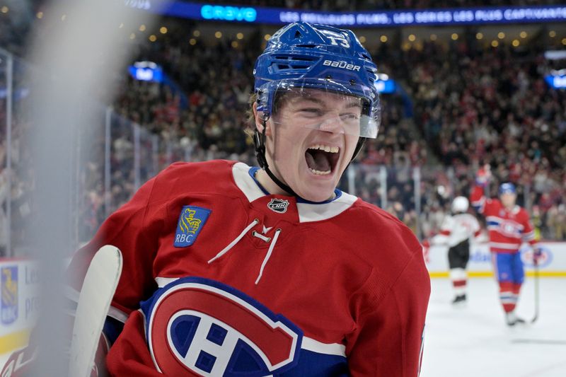 Jan 25, 2025; Montreal, Quebec, CAN; Montreal Canadiens forward Cole Caufield (13) celebrates after scoring a goal against the New Jersey Devils during the second period at the Bell Centre. Mandatory Credit: Eric Bolte-Imagn Images