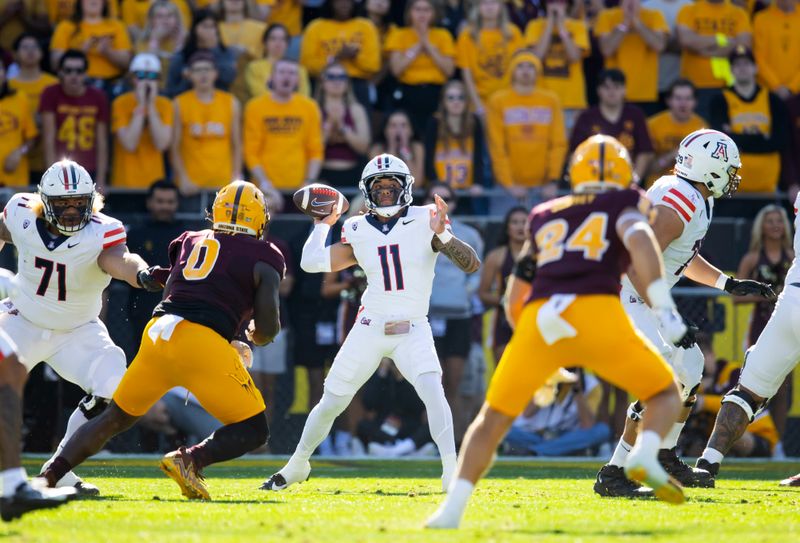 Nov 25, 2023; Tempe, Arizona, USA; Arizona Wildcats quarterback Noah Fifita (11) against the Arizona State Sun Devils in the first half of the Territorial Cup at Mountain America Stadium. Mandatory Credit: Mark J. Rebilas-USA TODAY Sports