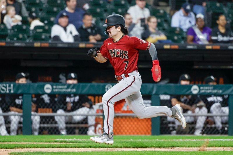 Sep 26, 2023; Chicago, Illinois, USA; Arizona Diamondbacks left fielder Corbin Carroll (7) runs to score against the Chicago White Sox during the third inning at Guaranteed Rate Field. Mandatory Credit: Kamil Krzaczynski-USA TODAY Sports