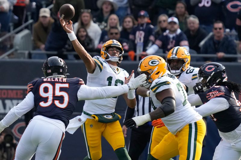 Green Bay Packers' Jordan Love throws a pass during the first half of an NFL football game against the Chicago Bears Sunday, Nov. 17, 2024, in Chicago. (AP Photo/Nam Y. Huh)