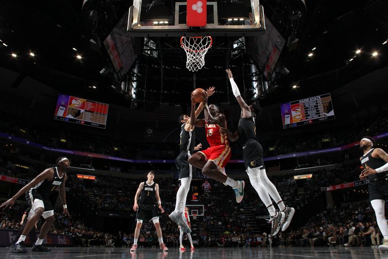 MEMPHIS, TN - MARCH 8: Clint Capela #15 of the Atlanta Hawks drives to the basket during the game against the Memphis Grizzlies on March 8, 2024 at FedExForum in Memphis, Tennessee. NOTE TO USER: User expressly acknowledges and agrees that, by downloading and or using this photograph, User is consenting to the terms and conditions of the Getty Images License Agreement. Mandatory Copyright Notice: Copyright 2024 NBAE (Photo by Joe Murphy/NBAE via Getty Images)