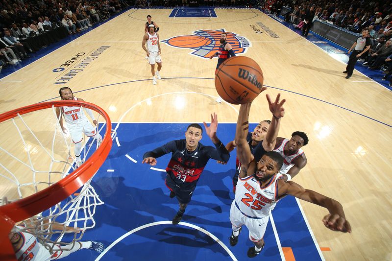 NEW YORK, NY - NOVEMBER 18: Mikal Bridges #25 of the New York Knicks rebounds the ball during the game against the Washington Wizards on November 18, 2024 at Madison Square Garden in New York City, New York.  NOTE TO USER: User expressly acknowledges and agrees that, by downloading and or using this photograph, User is consenting to the terms and conditions of the Getty Images License Agreement. Mandatory Copyright Notice: Copyright 2024 NBAE  (Photo by Nathaniel S. Butler/NBAE via Getty Images)