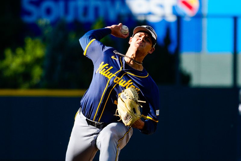 Jul 4, 2024; Denver, Colorado, USA; Milwaukee Brewers starting pitcher Tobias Myers (36) delivers a pitch against the Colorado Rockies during the first inning at Coors Field. Mandatory Credit: Troy Babbitt-USA TODAY Sports

 