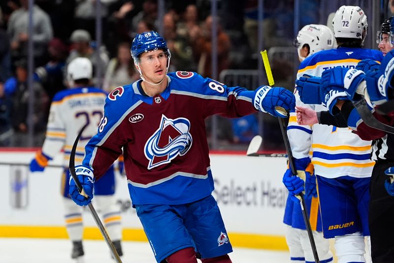 Nov 13, 2025; Denver, Colorado, USA; Colorado Avalanche center Martin Necas (88) celebrates his goal scored in the first period against the Buffalo Sabres at Ball Arena. Mandatory Credit: Ron Chenoy-Imagn Images