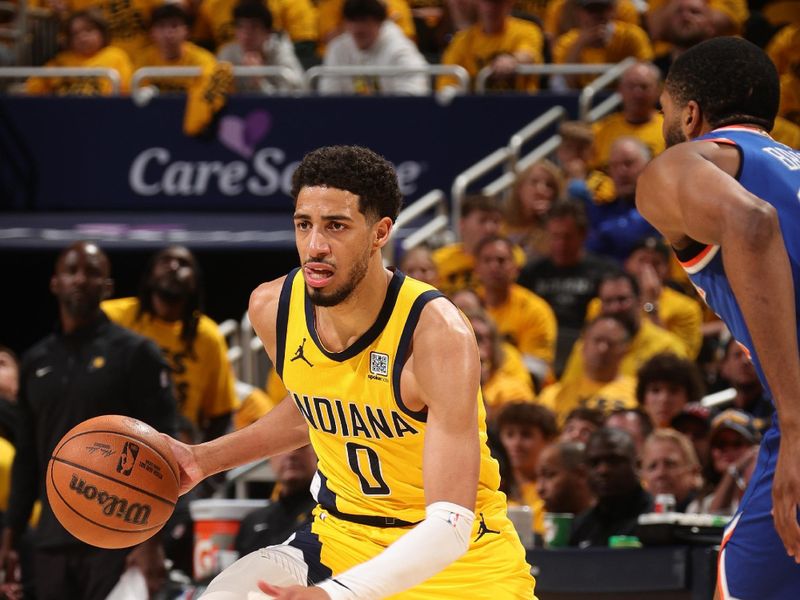 INDIANAPOLIS, IN - MAY 27:  Tyrese Haliburton #0 of the Indiana Pacers dribbles the ball during the game against the New York Knicks  during Game 4 of the 2025 Eastern Conference Finals on May 27, 2025 at Gainbridge Fieldhouse in Indianapolis, Indiana. NOTE TO USER: User expressly acknowledges and agrees that, by downloading and or using this Photograph, user is consenting to the terms and conditions of the Getty Images License Agreement. Mandatory Copyright Notice: Copyright 2025 NBAE (Photo by Nathaniel S. Butler/NBAE via Getty Images)