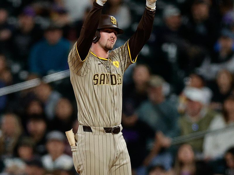 Apr 22, 2024; Denver, Colorado, USA; San Diego Padres center fielder Jackson Merrill (3) reacts from first after hitting an RBI single in the eighth inning against the Colorado Rockies at Coors Field. Mandatory Credit: Isaiah J. Downing-USA TODAY Sports