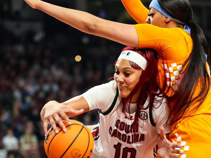 Mar 3, 2024; Columbia, South Carolina, USA; South Carolina Gamecocks center Kamilla Cardoso (10) attempts to shoot over Tennessee Lady Vols center Tamari Key (20) in the first half at Colonial Life Arena. Mandatory Credit: Jeff Blake-USA TODAY Sports