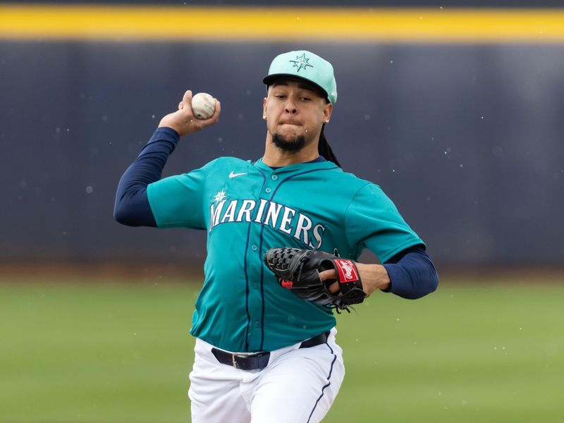Mar 3, 2025; Peoria, Arizona, USA; Seattle Mariners pitcher Luis Castillo against the Cleveland Guardians during a spring training game at Peoria Sports Complex. Mandatory Credit: Mark J. Rebilas-Imagn Images