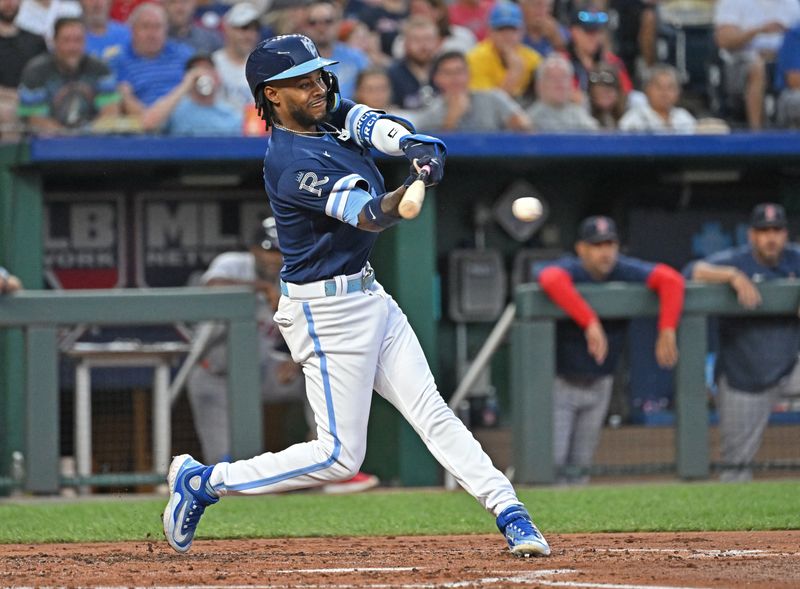 Sep 1, 2023; Kansas City, Missouri, USA;  Kansas City Royals third baseman Maikel Garcia (11) hits an RBI single in the second inning against the Boston Red Sox at Kauffman Stadium. Mandatory Credit: Peter Aiken-USA TODAY Sports