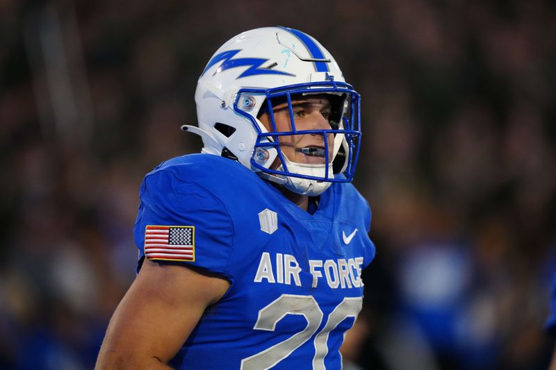 Sep 23, 2022; Colorado Springs, Colorado, USA; Air Force Falcons running back Brad Roberts (20) reacts following his touchdown in the second quarter against the Nevada Wolf Pack at Falcon Stadium. Mandatory Credit: Ron Chenoy-USA TODAY Sports