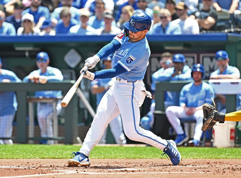 May 8, 2024; Kansas City, Missouri, USA;  Kansas City Royals designated hitter Michael Massey (19) drives in a run with a sacrifice fly in the first inning against the Milwaukee Brewers at Kauffman Stadium. Mandatory Credit: Peter Aiken-USA TODAY Sports