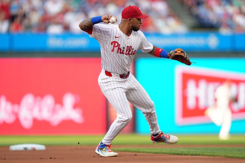 Jul 23, 2025; Philadelphia, Pennsylvania, USA; Philadelphia Phillies infielder Edmundo Sosa (33) throws to first against the Boston Red Sox in the first inning at Citizens Bank Park. Mandatory Credit: Kyle Ross-Imagn Images