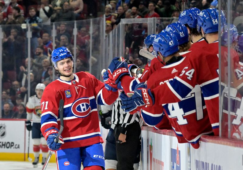 Apr 2, 2024; Montreal, Quebec, CAN; Montreal Canadiens forward Jake Evans (71) celebrates with teammates after scoring a goal against the Florida Panthers during the third period at the Bell Centre. Mandatory Credit: Eric Bolte-USA TODAY Sports