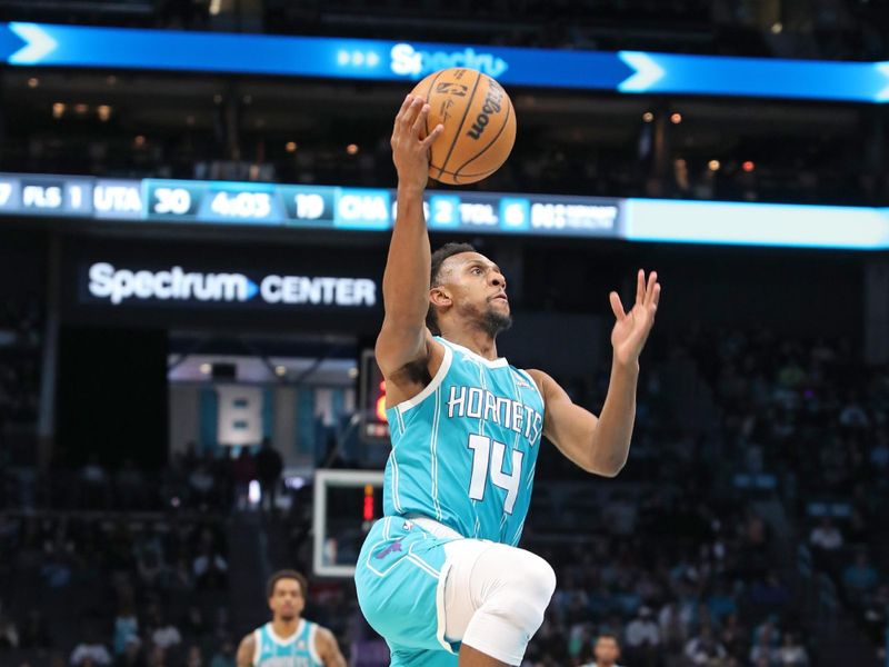 CHARLOTTE, NC - JANUARY 27: Ish Smith #14 of the Charlotte Hornets drives to the basket during the game against the Utah Jazz on January 27, 2024 at Spectrum Center in Charlotte, North Carolina. NOTE TO USER: User expressly acknowledges and agrees that, by downloading and or using this photograph, User is consenting to the terms and conditions of the Getty Images License Agreement.  Mandatory Copyright Notice:  Copyright 2024 NBAE (Photo by Brock Williams-Smith/NBAE via Getty Images)