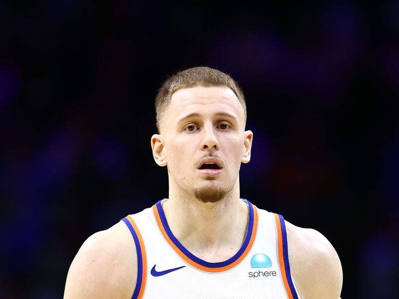 PHILADELPHIA, PENNSYLVANIA - FEBRUARY 22: Donte DiVincenzo #0 of the New York Knicks reacts during the fourth quarter against the Philadelphia 76ers at the Wells Fargo Center on February 22, 2024 in Philadelphia, Pennsylvania. (Photo by Tim Nwachukwu/Getty Images)