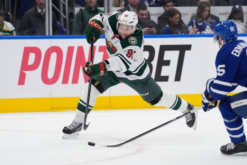 Jan 19, 2026; Toronto, Ontario, CAN; Minnesota Wild forward Vladimir Tarasenko (91) shoots the puck against the Toronto Maple Leafs during the second period at Scotiabank Arena. Mandatory Credit: John E. Sokolowski-Imagn Images