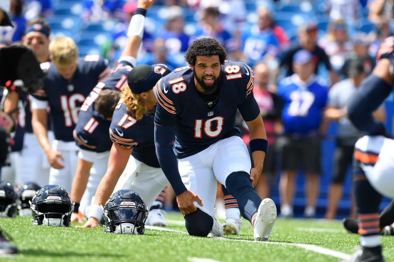 Chicago Bears quarterback Caleb Williams stretches before an preseason NFL football game against the Buffalo Bills, Saturday, Aug. 10, 2024, in Orchard Park, NY. (AP Photo/Adrian Kraus)