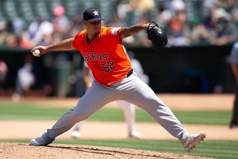 Jul 24, 2024; Oakland, California, USA; Houston Astros pitcher Bryan Abreu (52) delivers against the Oakland Athletics during the seventh inning at Oakland-Alameda County Coliseum. Mandatory Credit: D. Ross Cameron-USA TODAY Sports