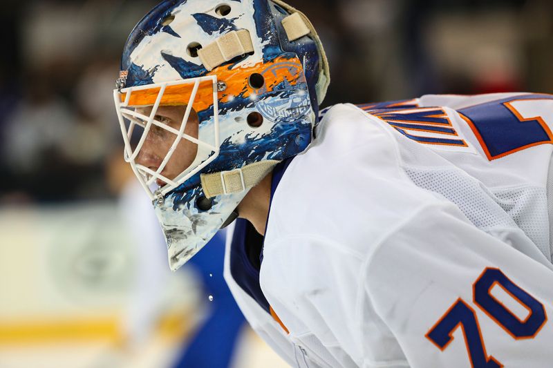 Sep 24, 2024; New York, New York, USA; New York Islanders goalie Henrik Tikkanen (70) skates during the third period against the New York Rangers at Madison Square Garden. Mandatory Credit: Danny Wild-Imagn Images