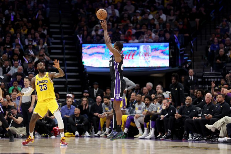 SACRAMENTO, CALIFORNIA - MARCH 13: Harrison Barnes #40 of the Sacramento Kings shoots over LeBron James #23 of the Los Angeles Lakers in the second half at Golden 1 Center on March 13, 2024 in Sacramento, California. NOTE TO USER: User expressly acknowledges and agrees that, by downloading and or using this photograph, User is consenting to the terms and conditions of the Getty Images License Agreement.  (Photo by Ezra Shaw/Getty Images)