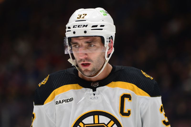 Feb 25, 2023; Vancouver, British Columbia, CAN; Boston Bruins forward Patrice Bergeron (37) awaits the start of play against the Vancouver Canucks during the second period at Rogers Arena. Mandatory Credit: Anne-Marie Sorvin-USA TODAY Sports