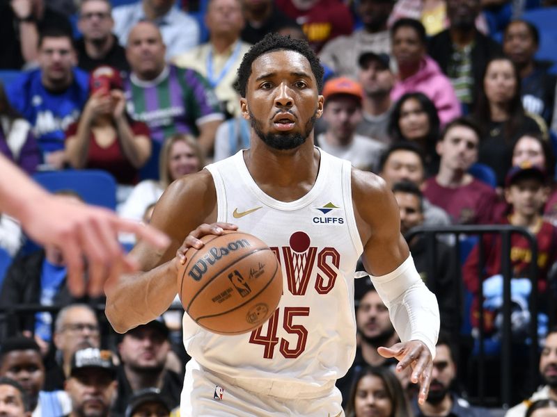 ORLANDO, FL - FEBRUARY 25:  Donovan Mitchell #45 of the Cleveland Cavaliers dribbles the ball during the game against the Orlando Magic  on February 25, 2025 at Kia Center in Orlando, Florida. NOTE TO USER: User expressly acknowledges and agrees that, by downloading and or using this photograph, User is consenting to the terms and conditions of the Getty Images License Agreement. Mandatory Copyright Notice: Copyright 2025 NBAE (Photo by Fernando Medina/NBAE via Getty Images)