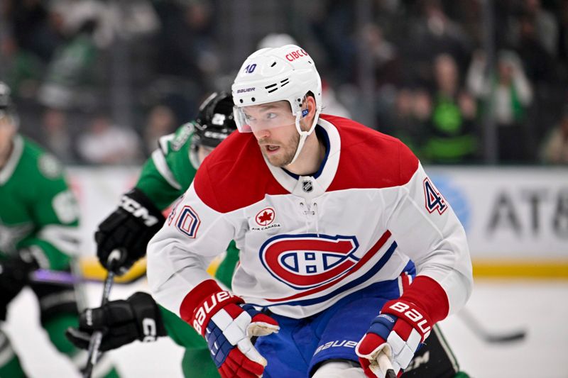 Jan 16, 2025; Dallas, Texas, USA; Montreal Canadiens right wing Joel Armia (40) skates with the puck and scores an empty net goal against the Dallas Stars during the third period at the American Airlines Center. Mandatory Credit: Jerome Miron-Imagn Images