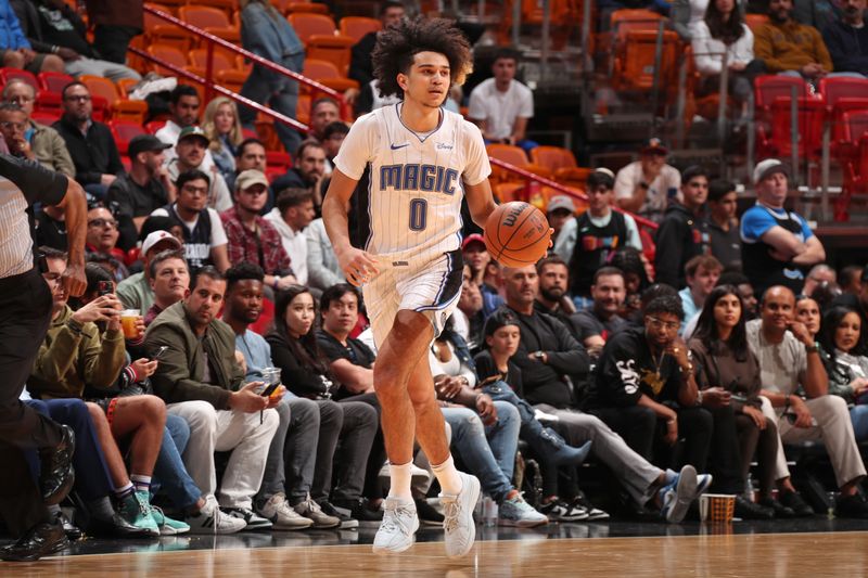 MIAMI, FL - FEBRUARY 6: Anthony Black #0 of the Orlando Magic dribbles the ball during the game against the Miami Heat on February 6, 2024 at Kaseya Center in Miami, Florida. NOTE TO USER: User expressly acknowledges and agrees that, by downloading and or using this Photograph, user is consenting to the terms and conditions of the Getty Images License Agreement. Mandatory Copyright Notice: Copyright 2024 NBAE (Photo by Issac Baldizon/NBAE via Getty Images)