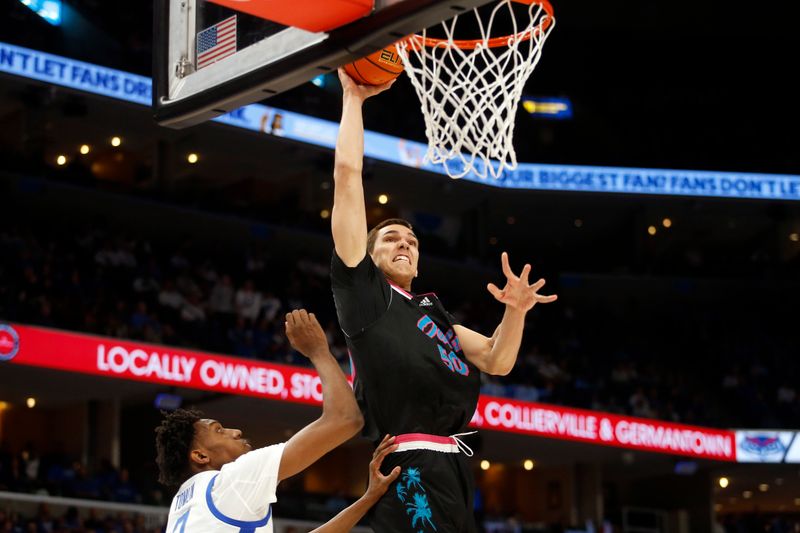 Feb 25, 2024; Memphis, Tennessee, USA; Florida Atlantic Owls center Vladislav Goldin (50) dunks during the second half against the Memphis Tigers at FedExForum. Mandatory Credit: Petre Thomas-USA TODAY Sports