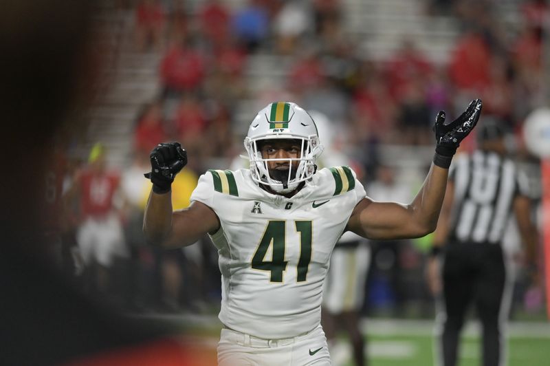 Sep 9, 2023; College Park, Maryland, USA;  Charlotte 49ers linebacker Nikhai Hill-Green (41) reacts after stoping Maryland Terrapins offense on third down during the first half at SECU Stadium. Mandatory Credit: Tommy Gilligan-USA TODAY Sports