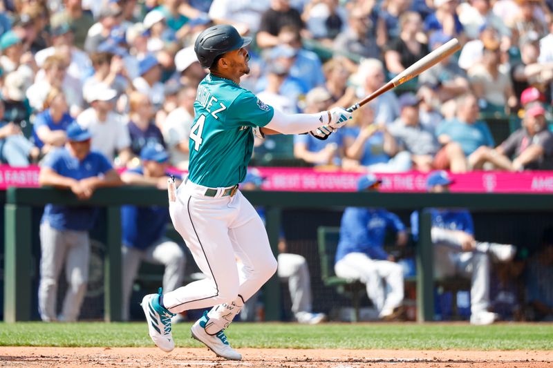 Aug 28, 2023; Seattle, Washington, USA; Seattle Mariners center fielder Julio Rodriguez (44) hits a two-run home run against the Kansas City Royals during the fifth inning at T-Mobile Park. Mandatory Credit: Joe Nicholson-USA TODAY Sports