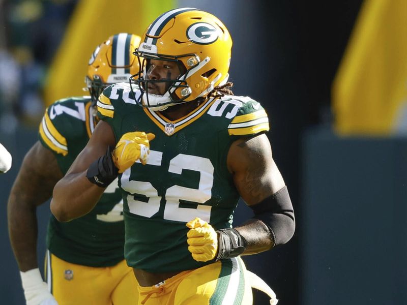 Green Bay Packers linebacker Rashan Gary (52) rushes during an NFL football game against the New England Patriots Sunday, Oct. 2, 2022, in Green Bay, Wis. (AP Photo/Jeffrey Phelps)