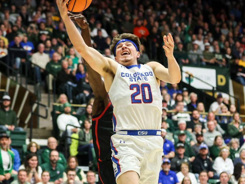 Jan 30, 2024; Fort Collins, Colorado, USA; Colorado State Rams guard Joe Palmer (20) drives to the basket during the 2nd half against the San Diego State Aztecs at Moby Arena. Mandatory Credit: Chet Strange-USA TODAY Sports