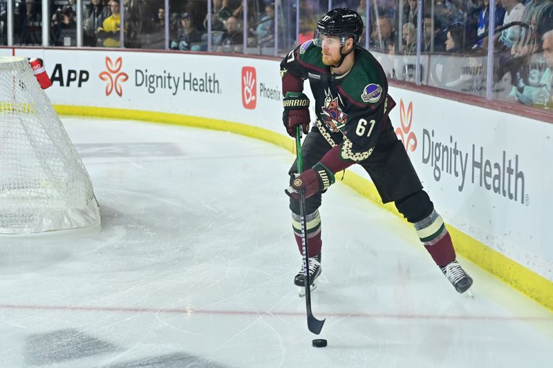 Nov 7, 2023; Tempe, Arizona, USA; Arizona Coyotes left wing Lawson Crouse (67) carries the puck in the second period against the Seattle Kraken at Mullett Arena. Mandatory Credit: Matt Kartozian-USA TODAY Sports