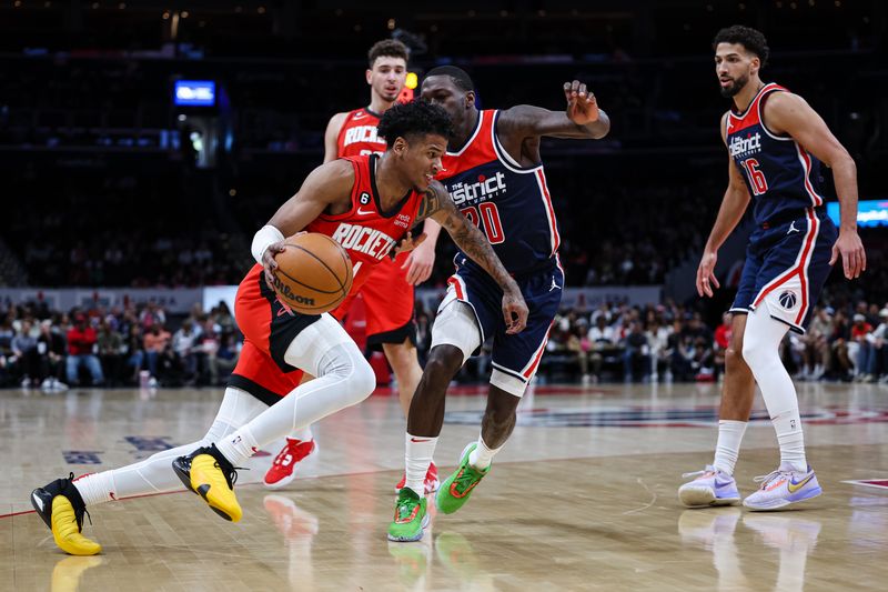 WASHINGTON, DC - APRIL 09: Jalen Green #4 of the Houston Rockets drives to the basket against Kendrick Nunn #20 of the Washington Wizards during the first half at Capital One Arena on April 9, 2023 in Washington, DC. NOTE TO USER: User expressly acknowledges and agrees that, by downloading and or using this photograph, User is consenting to the terms and conditions of the Getty Images License Agreement. (Photo by Scott Taetsch/Getty Images)