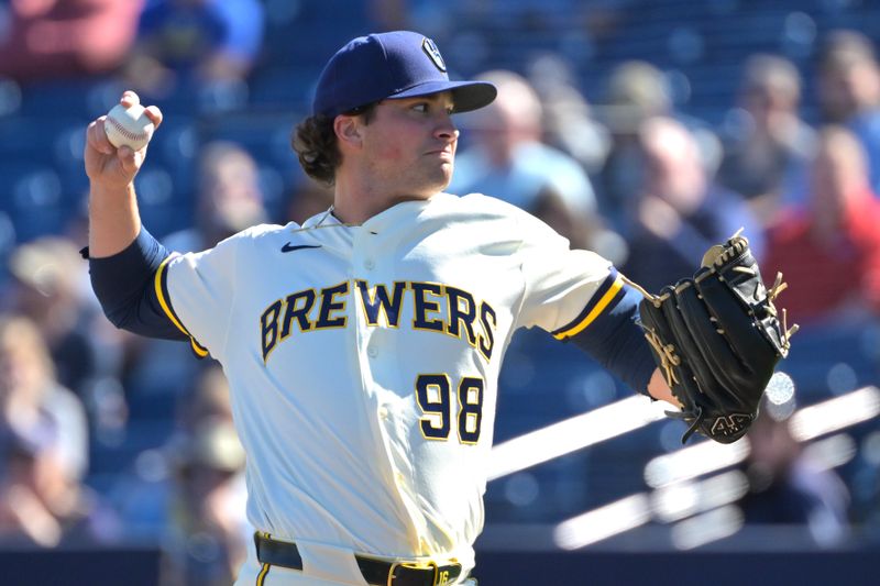 Feb 21, 2026; Phoenix, Arizona, USA;  Milwaukee Brewers pitcher Will Childers (98) delivers to the plate in the third inning against the against the Cleveland Guardians at American Family Fields of Phoenix. Mandatory Credit: Jayne Kamin-Oncea-Imagn Images