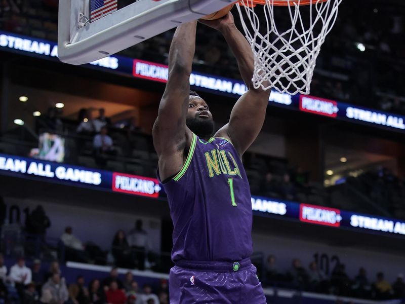 NEW ORLEANS, LOUISIANA - JANUARY 07: Zion Williamson #1 of the New Orleans Pelicans dunks as Julius Randle #30 of the Minnesota Timberwolves defends during the first half at the Smoothie King Center on January 07, 2025 in New Orleans, Louisiana. NOTE TO USER: User expressly acknowledges and agrees that, by downloading and or using this Photograph, user is consenting to the terms and conditions of the Getty Images License Agreement. (Photo by Jonathan Bachman/Getty Images)