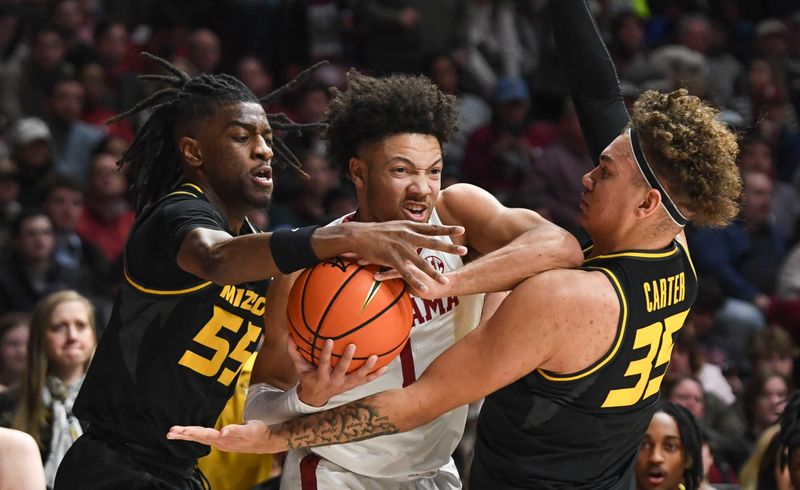 Jan 16, 2024; Tuscaloosa, Alabama, USA; Missouri guard Sean East II (55) and Missouri forward Noah Carter (35) trap Alabama guard Mark Sears (1) at Coleman Coliseum. Mandatory Credit: Gary Cosby Jr.-USA TODAY Sports