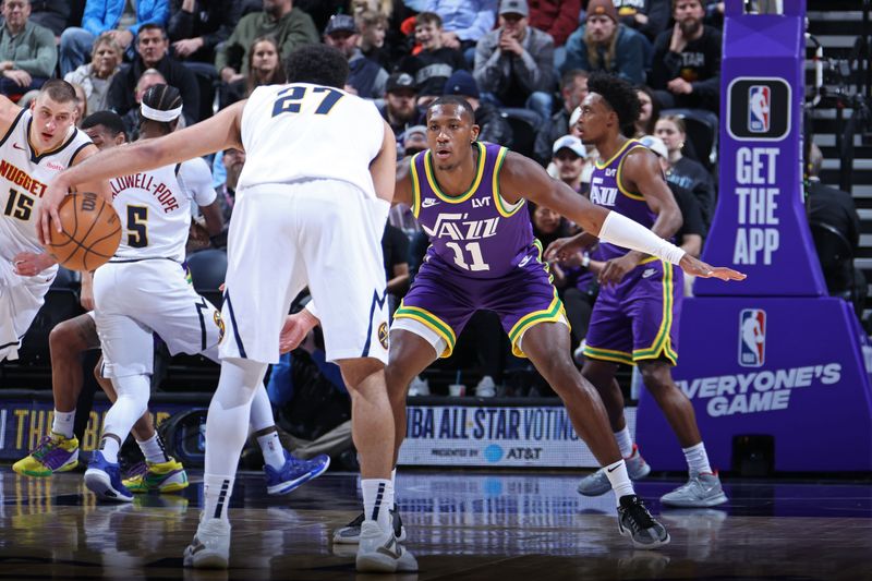 SALT LAKE CITY, UT - JANUARY 10: Kris Dunn #11 of the Utah Jazz plays defense during the game against the Denver Nuggets on January 10, 2024 at Delta Center in Salt Lake City, Utah. NOTE TO USER: User expressly acknowledges and agrees that, by downloading and or using this Photograph, User is consenting to the terms and conditions of the Getty Images License Agreement. Mandatory Copyright Notice: Copyright 2024 NBAE (Photo by Melissa Majchrzak/NBAE via Getty Images)