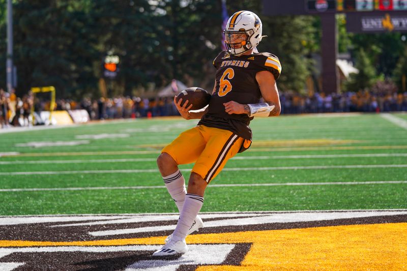 Clash at Falcon Stadium: Wyoming Cowboys Take on Air Force Falcons in College Football Showdown