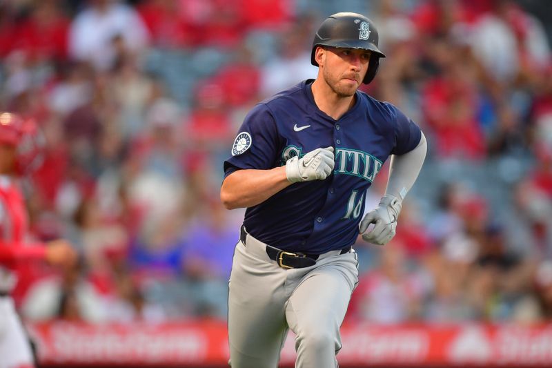 Aug 30, 2024; Anaheim, California, USA; Seattle Mariners designated hitter Mitch Garver (18) runs after hitting a two run RBI double against the Los Angeles Angels during the first inning at Angel Stadium. Mandatory Credit: Gary A. Vasquez-USA TODAY Sports