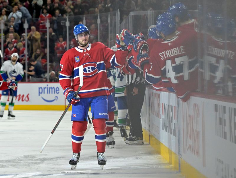 Jan 6, 2025; Montreal, Quebec, CAN; Montreal Canadiens forward Kirby Dach (77) celebrates with teammates after scoring a goal against the Vancouver Canucks during the third period at the Bell Centre. Mandatory Credit: Eric Bolte-Imagn Images